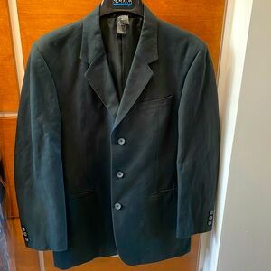Young man’s black blazer 38 Regular. Worn very little.